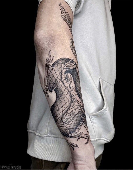 Tatuagem no Braço Masculino: 30 Fotos de Uma Jornada de Pele e Alma 3 tatuagem masculina no braco foto 3